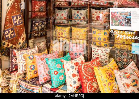 Bodrum, Turkey - September 23rd 2019: Shop selling turkish design cushions. There is a large shopping area aimed at tourists. Stock Photo