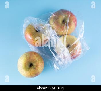 some apples in a plastic bag Stock Photo