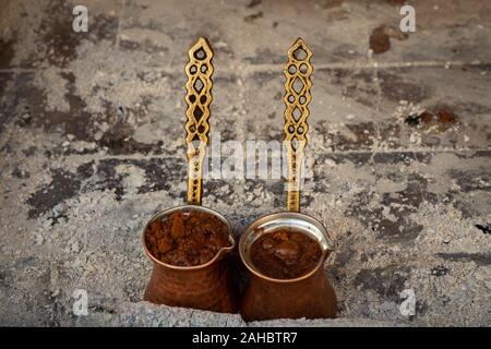 two traditional pots for brewing Turkish coffee Stock Photo