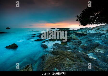 Seascape on the vibrant sunsets in Tanjung Bidara Beach, Malacca. Stock Photo