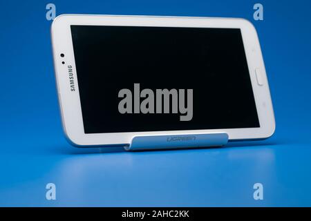 Old Samsung tablet on a portable stand Stock Photo