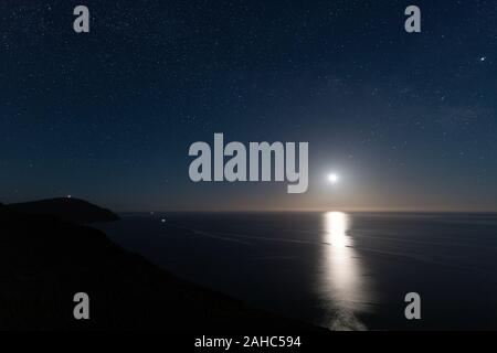 Night landscape with moon from the viewpoint of the Amatista. Natural Park of Cabo de Gata. Spain. Stock Photo