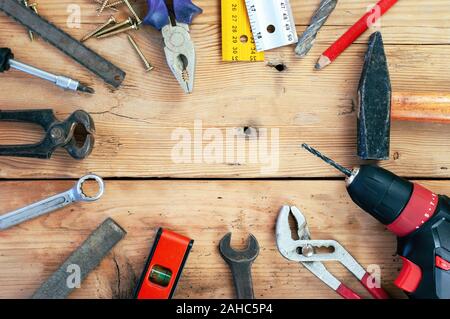 Set of hand tools on wooden background Stock Photo