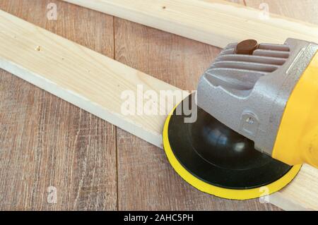 Sander machine on wooden background Stock Photo