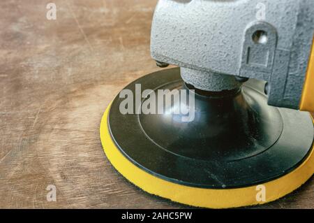 Sander machine on wooden background Stock Photo