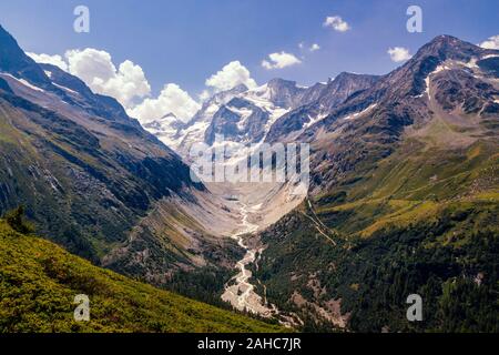 Scenic view on some high peaks of the Pennine alps near Val 'd Anniviers and glaciers running down to the valley in summer Stock Photo