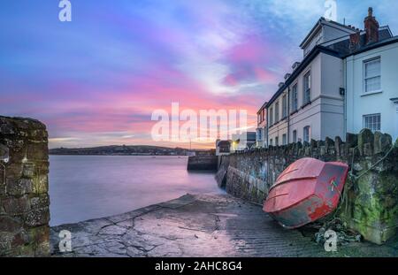 Appledore, North Devon, England. Saturday 28th December 2019. UK Weather. Light cloud and a gentle breeze at dawn in North Devon, as the tide recedes at West Quay in the picturesque coastal village of Appledore. Terry Mathews/Alamy Live News. Stock Photo
