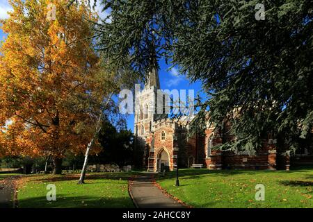 Autumn colours over St Marys church, Finedon village, Northamptonshire, England, UK Stock Photo