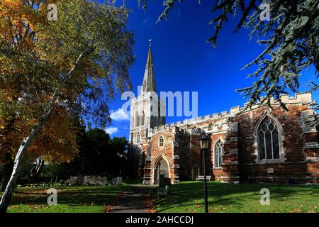 Autumn colours over St Marys church, Finedon village, Northamptonshire, England, UK Stock Photo