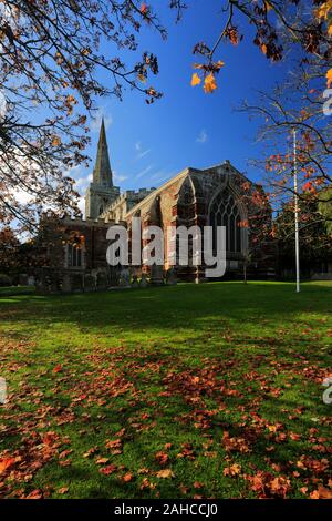 Autumn colours over St Marys church, Finedon village, Northamptonshire, England, UK Stock Photo