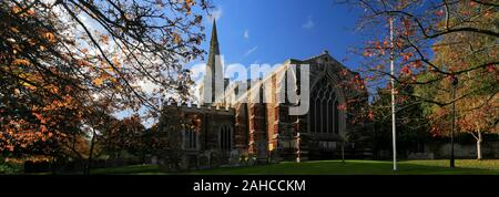 Autumn colours over St Marys church, Finedon village, Northamptonshire, England, UK Stock Photo