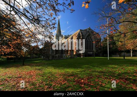 Autumn colours over St Marys church, Finedon village, Northamptonshire, England, UK Stock Photo