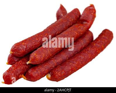 Appetizing Tyrolean hunter sausages traditionally lightly smoked over beech wood and dried in air. Isolated over white background Stock Photo