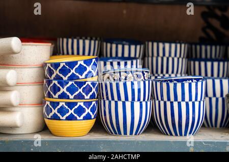 Cute ceramic cereal bowls for sale at a market in New Delhi India Stock Photo