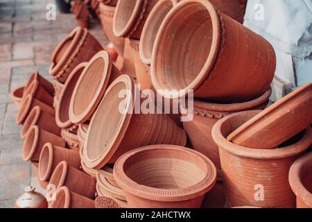 Terracotta clay planter pots for plants on sale at a street market in New Delhi India Stock Photo