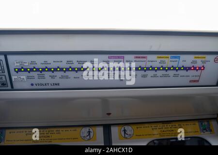 Delhi, India - December 14, 2019: Map of the New Delhi metro train system as seen inside a passenger car Stock Photo