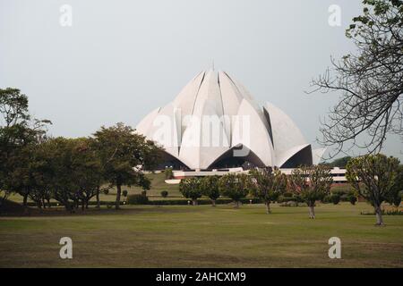 New Delhi, India - December 14, 2019:   Lotus Temple, a Bahai House of Worship, built in 1986 and open to all religons Stock Photo