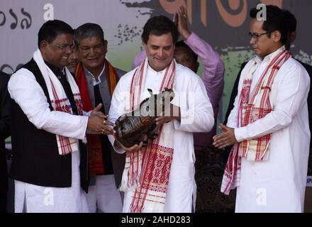 Guwahati, Assam, India. 28th Dec, 2019. Congress leader Rahul Gandhi being felicitated during a protest rally against the Citizenship (Amendment) Act in Guwahati, Congress MP from Assam Gaurav Gogoi is also seen. Credit: David Talukdar/ZUMA Wire/Alamy Live News Stock Photo