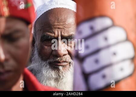 Guwahati, Assam, India. 28th Dec, 2019. Supporters of India's main opposition Congress party during a protest rally against a new citizenship law, in Guwahati. Credit: David Talukdar/ZUMA Wire/Alamy Live News Stock Photo