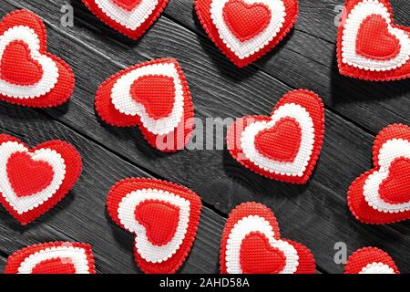 Happy Valentine's day hearts on wooden background. Love concept for mother's day and valentine's day. Stock Photo