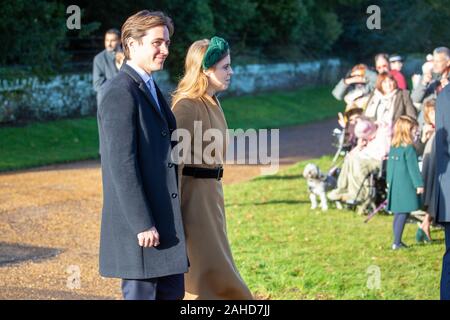 Picture dated December 25th shows Princess Beatrice and Fianc, Edoardo Mapelli Mozzi,at the Christmas Day morning church service at St Mary Magdalene Church in Sandringham, Norfolk.   Prince Andrew kept a low profile as members of the Royal Family attended Christmas Day church services in Sandringham in Norfolk. While a large crowd watched the Queen and family members arrive for the main 11am service, the prince attended an earlier service. Prince Andrew was also absent as family members left the church after the service to greet members of the public. Prince Philip, who was released from hos Stock Photo