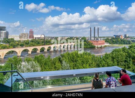 View from the Endless Bridge over the Stone Arch Bridge, Mississippi River and St Anthony Falls, Guthrie Theater, Minneapolis, Minnesota, USA Stock Photo