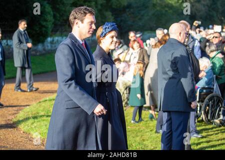 Picture dated December 25th shows Jack Brooksbank and  Princess Eugenie of York,at the Christmas Day morning church service at St Mary Magdalene Church in Sandringham, Norfolk.   Prince Andrew kept a low profile as members of the Royal Family attended Christmas Day church services in Sandringham in Norfolk. While a large crowd watched the Queen and family members arrive for the main 11am service, the prince attended an earlier service. Prince Andrew was also absent as family members left the church after the service to greet members of the public. Prince Philip, who was released from hospital Stock Photo