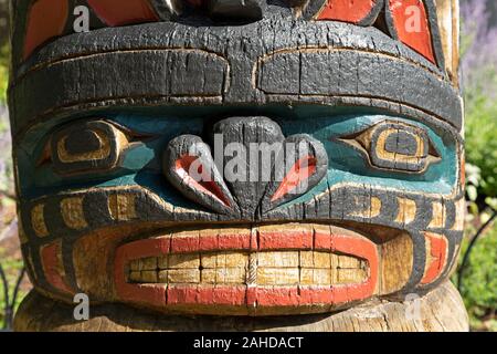 Detail of the Kwakiutl Totem at Confederation Park in Ottawa, Canada. The totem was carved by Henry Hunt in 1971 to commemorate the centenary of Briti Stock Photo