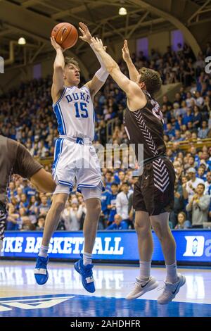 Duke guard Alex O'Connell (15) dunks over Virginia Tech forward John ...