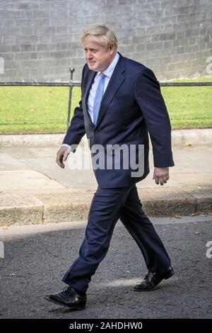 Prime Minister Boris Johnson walks outside No 10 Downing Street, Westminster, London, UK Stock Photo