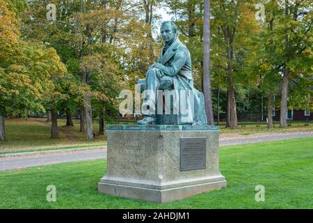 COOPERSTOWN, NY/USA - SEPTEMBER 28, 2019: James Fenimore Cooper statue at historic Ostego Hall. Stock Photo