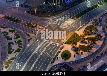 High View of West bay Intersection, with yellow cross walk markings, traffic signal lights, and curb cuts Stock Photo