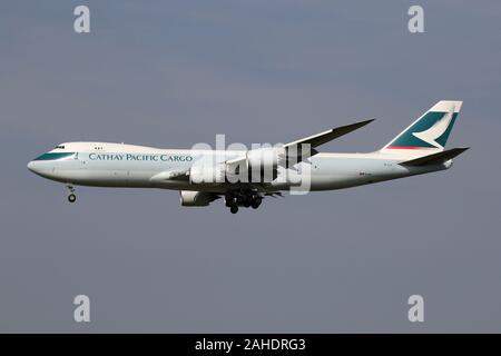 Cathay Pacific Cargo Boeing 747-8F with registration B-LJI on short final for runway 18C of Amsterdam Airport Schiphol. Stock Photo