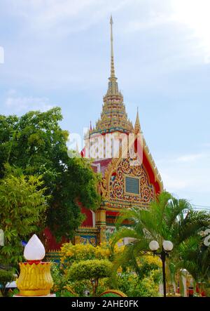 Buddhist shrine at the Wat Suwankiriket school temple in Karon, province of Phuket, Thailand.