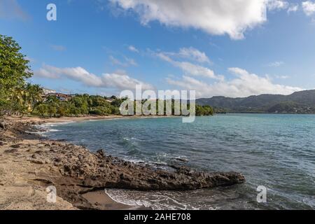 Rolling waves and shore line in Sainte-Luce, Martinique, France Stock Photo