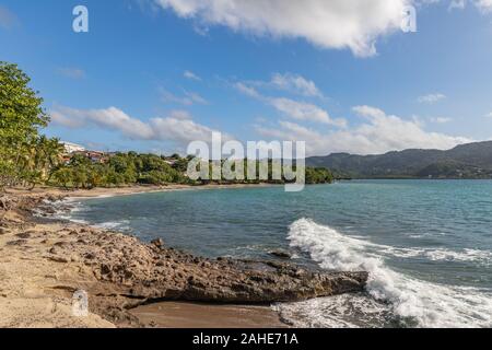 Rolling waves and shore line in Sainte-Luce, Martinique, France Stock Photo