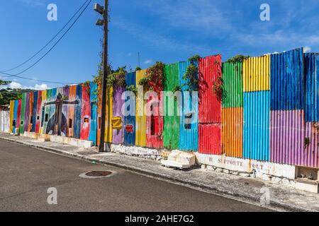 Bright painted wall in Vauclin, Martinique, France Stock Photo