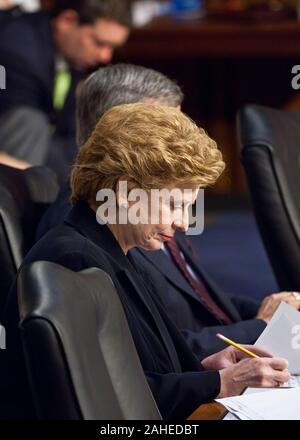 Senator Debbie Stabenow, Chairwoman of the U.S. Senate Committee on Agriculture, Nutrition and Forestry makes notes during a hearing with Agriculture Secretary Tom Vilsack on the next Farm Bill in Washington, DC, Thur., May 26, 2011. Chairwoman Stabenow highlighted the strides agriculture has made in the past several decades noting that the average American farmer feeds an estimated 150 people. Stock Photo