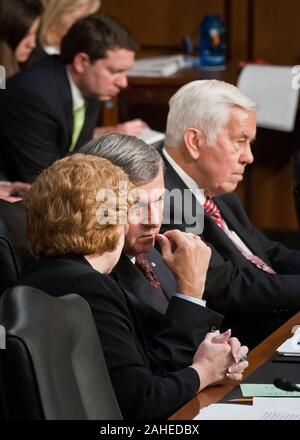 Senator Debbie Stabenow, MI, Chairwoman of the U.S. Senate Committee on Agriculture, Nutrition and Forestry and Senator and former Agriculture Secretary Mike Johanns, NE, discuss the proceedings during a hearing on the next Farm Bill with Agriculture Secretary Tom Vilsack in Washington, DC, Thur., May 26, 2011. Next to Senator Johanns is former Chairman Senator Richard Lugar, IN. Stock Photo