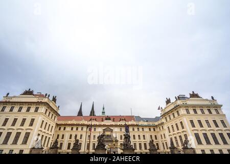 Nove Kralovsky Palac or New Royal Palace in Prague Castle (Prazsky Hrad), seen from its main gate, with its statues of the Wrestling giants, also call Stock Photo