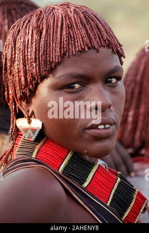 Hamer tribe - Woman portrait during 'bull jump': the most important ceremony for young men, the final test before passing into adulthood. Ethiopia Stock Photo