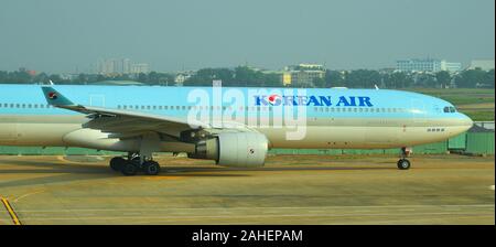 Saigon, Vietnam - Feb 8, 2018. Korean Air Boeing 777-300ER taxiing on runway of Tan Son Nhat Airport (SGN). Stock Photo