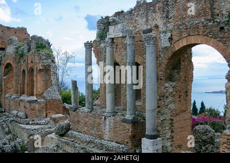 Ruins of ancient Greek theatre in Taormina - Teatro antico di Taormina. Taormina is located in the city of Messina, on the island of Sicily, Italy Stock Photo