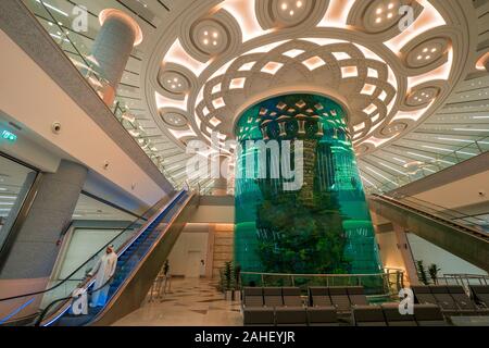 The huge coral reef aquarium at the arrival hall of the brand new Terminal 1 at the King Abdulaziz International Airport in Jeddah, Saudi Arabia Stock Photo
