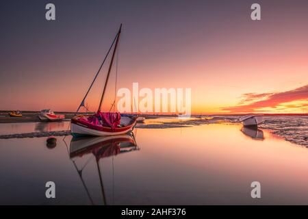 Dawn at Mow Creek in Brancaster Staithe on the north Norfolk coast. Stock Photo