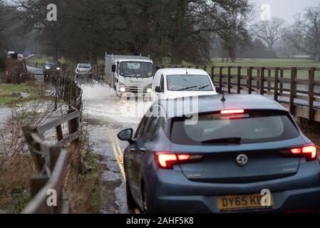 Lacock, Wiltshire, UK. 20th December 2019.  The Environment Agency has issued a red flood warning for Reybridge next to the historic village of Lacock Stock Photo