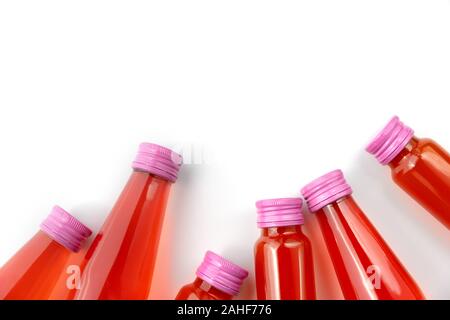 Collagen drinks in glass bottles isolated on white background. Beauty elixir water juice branding mock up template with copy space. Stock Photo
