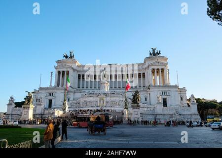 Rome,national monument in venezia square with tourist people and traffic,italy  Stock Photo