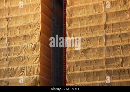 construction site in Seoul covered with tarpaulin Stock Photo