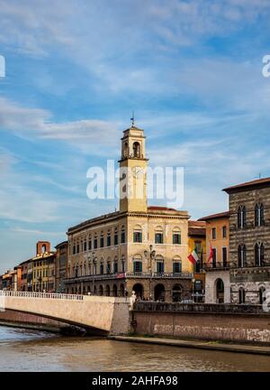 Palazzo Pretorio and Ponte Di Mezzo over Arno River, Pisa, Tuscany, Italy Stock Photo